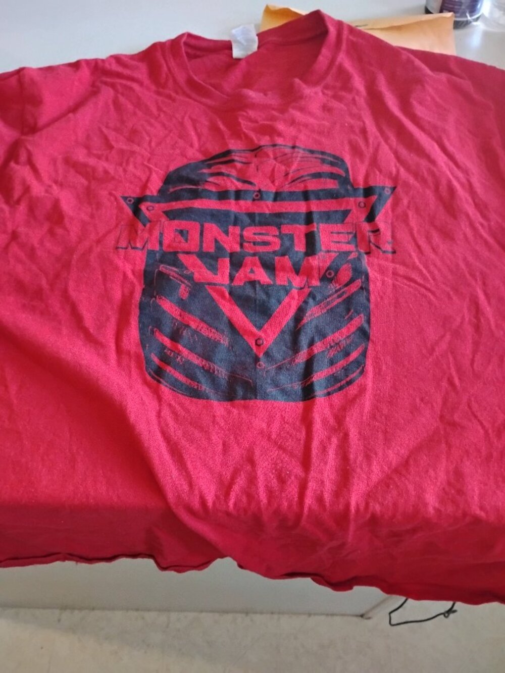2 MONSTER JAM XL tee shirts